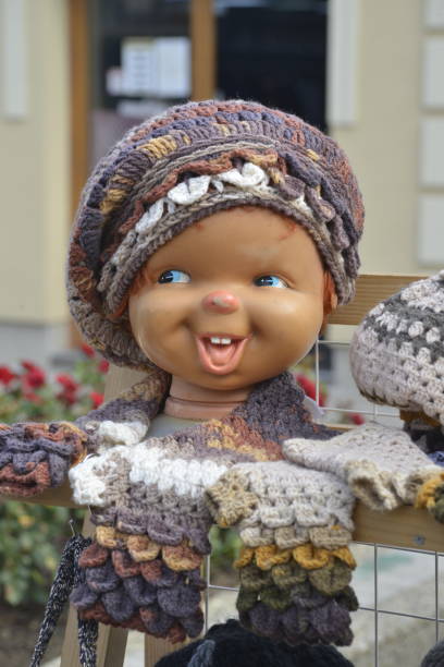 istock Plastic heads as models for woolen caps and scarves 1057301330