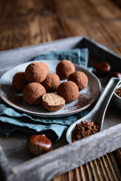istock Chestnut truffles coated with cocoa powder 1057308398