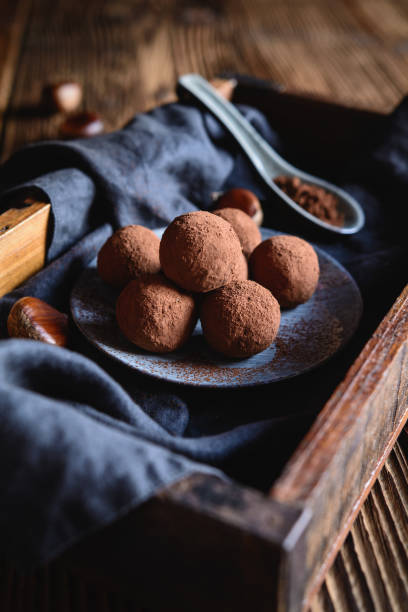 istock Chestnut truffles coated with cocoa powder 1057309424