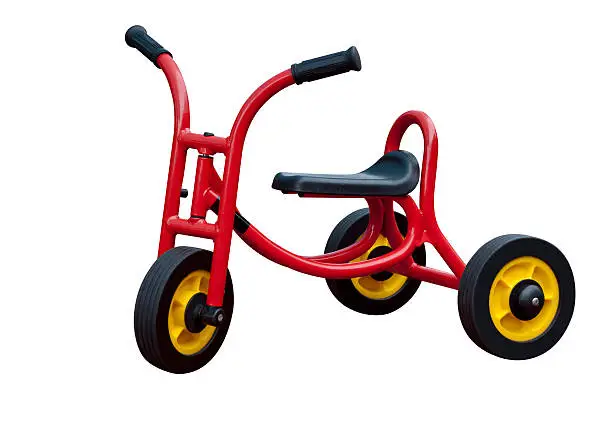 Photo of Childs Tricycle red modern, isolated on white background