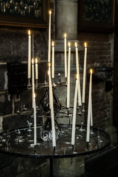 istock Wax candles in a church 1057317560