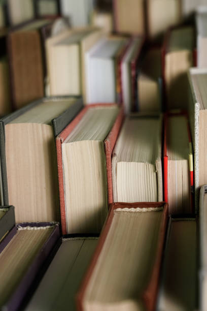 istock Stack of books background. many books piles. 1057343700