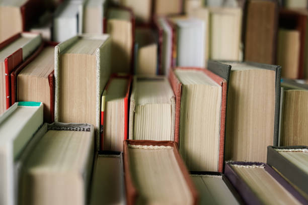 istock Stack of books background. many books piles. 1057343704