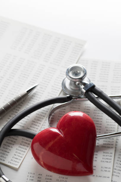 istock Black doctor stethoscope and heart shape isolated on white background 1057349994