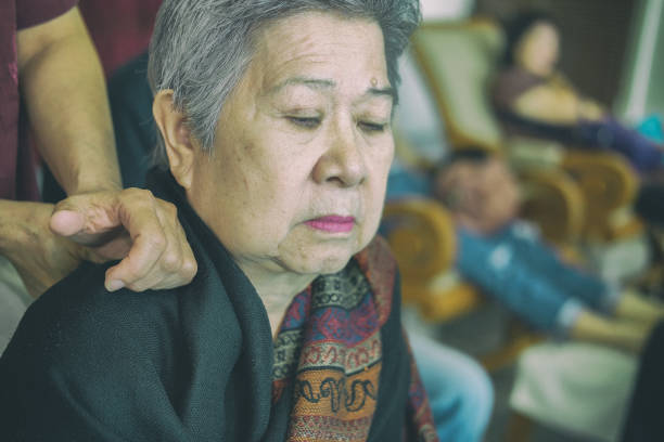 istock physiotherapist massage old woman shoulder 1057359218