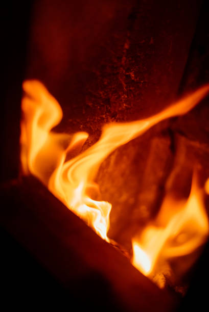 istock Flames Inside Of A Fireplace 1057369314