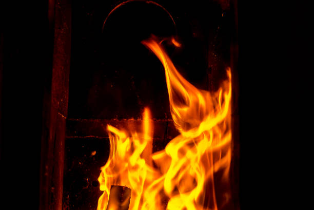 istock Flames Inside Of A Fireplace 1057369638