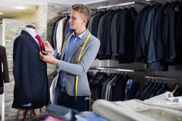 istock man seller measuring business style jacket 1057389622