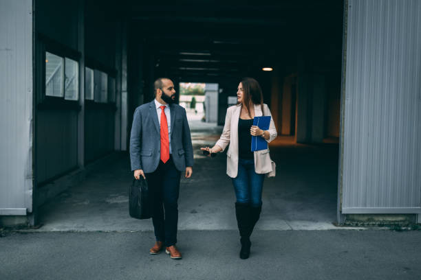 istock Young business people going from the office 1057393622
