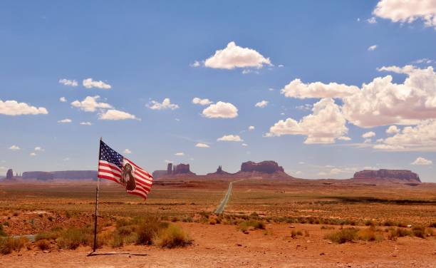 istock Monument Valley with Navajo Flag 1057400748