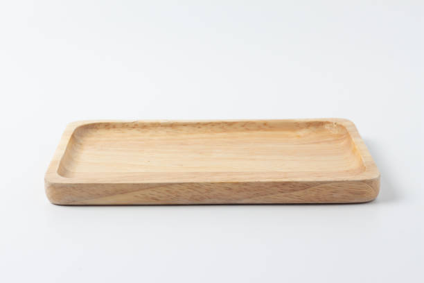 istock wooden plate isolated on white background 1057403766