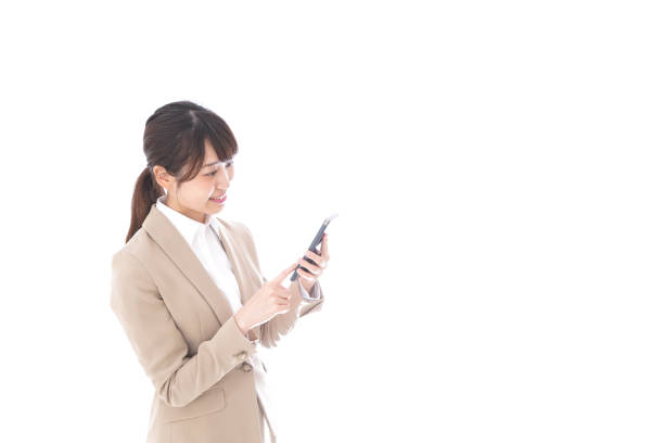 istock Asian woman using smartphone 1057409408