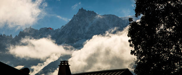Mont Blanc Towering over the chimney of a house stock photo