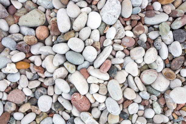 istock Background from sea pebble. Small stones, top view 1057435472