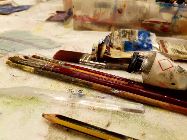 istock Art and creativity. Tools for the artist, objects for drawing, painting. 1057444282
