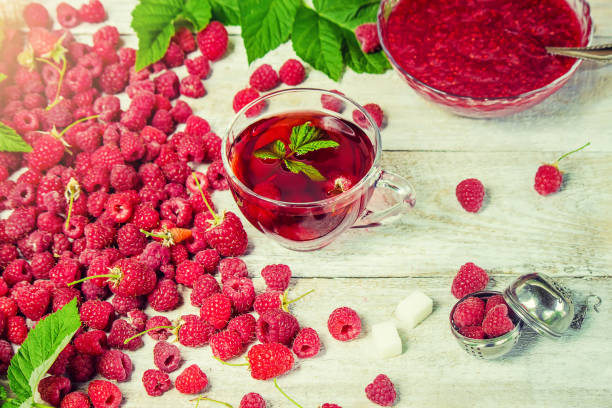 istock Raspberries on a wooden background. Selective focus. Food. 1057459088