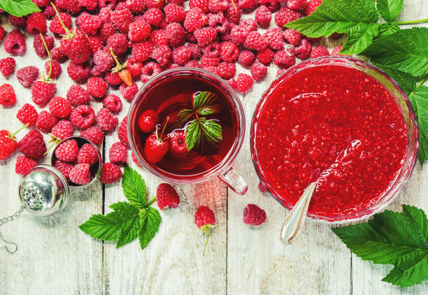 istock Raspberries on a wooden background. Selective focus. Food. 1057459112