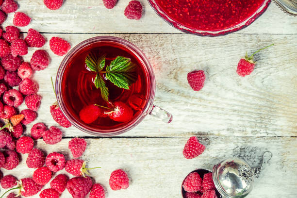 Raspberries on a wooden background. Selective focus. Food.