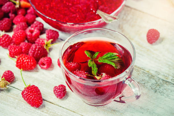 istock Raspberries on a wooden background. Selective focus. Food. 1057459128
