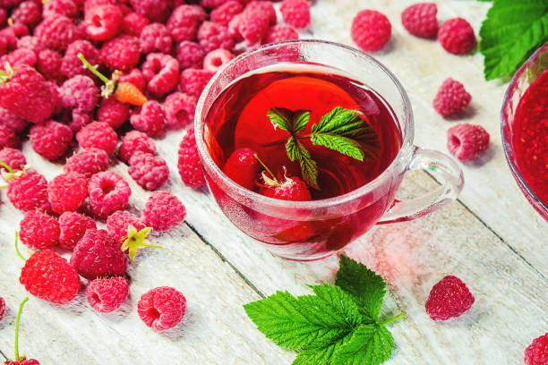 istock Raspberries on a wooden background. Selective focus. Food. 1057459140
