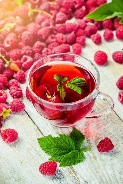 istock Raspberries on a wooden background. Selective focus. Food. 1057459142