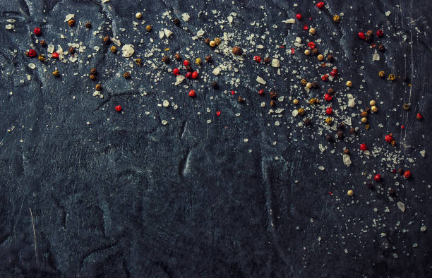 istock Spices and herbs on dark background textures. Selective focus. 1057461674