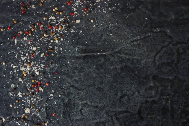 istock Spices and herbs on dark background textures. Selective focus. 1057461678