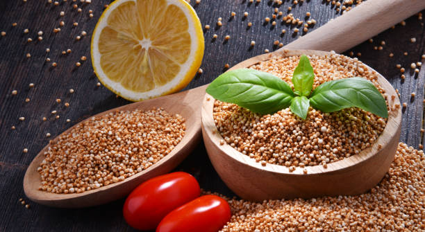 istock Bowl of amaranth grain on wooden table 1057477598