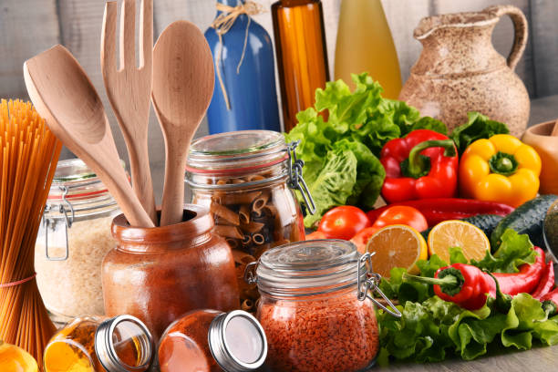 istock Composition with assorted food products and kitchen utensils 1057478260