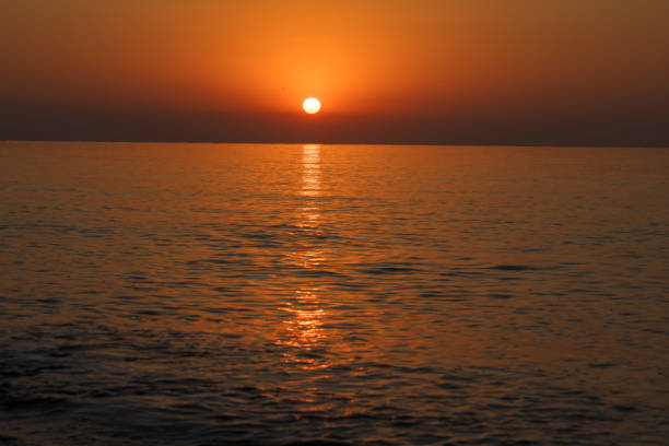 istock Beautiful seascape. Sunrise at sea 1057478664