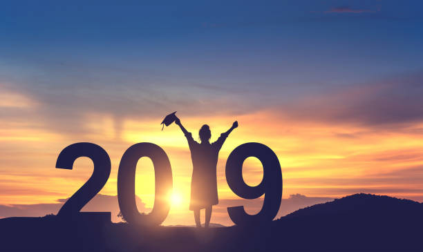 Silhouette Young woman Graduation in 2019 years, Concept education congratulation, copy space. Silhouette Young woman Graduation in 2019 years, Concept education congratulation, copy space. 2019 stock pictures, royalty-free photos & images