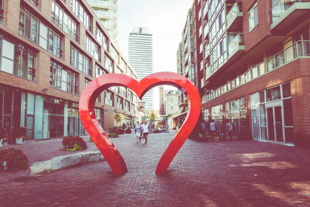 TORONTO, CANADA - SEPTEMBER 18, 2018: Distillery District (former Gooderham & Worts Distillery) - historic and entertainment precinct. It contains numerous cafes, restaurants, shops and industrial parts.