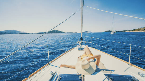 istock Woman lying on yacht deck 1057488160