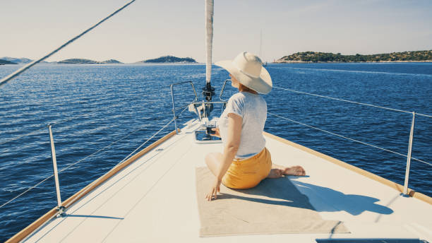 istock Woman relaxing on yacht deck 1057488196