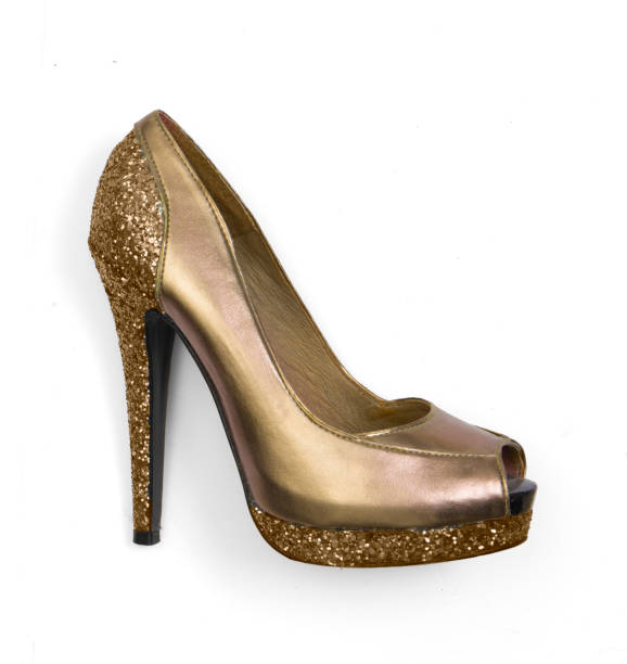 istock gold glitter high heel peeptoe shoe isolated on white background 1057491570