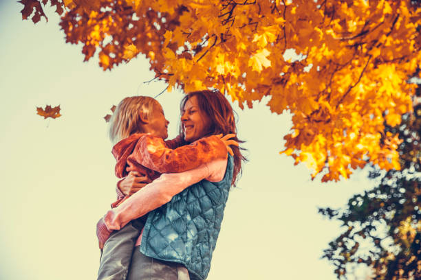 istock Mother and child in the park 1057493096
