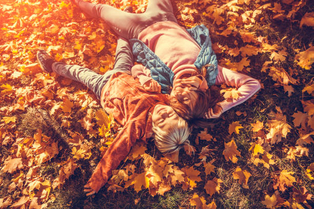 istock Mother and child in the park 1057493130