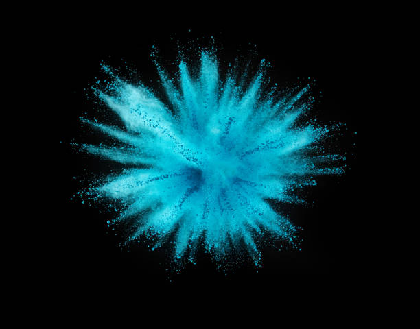 istock Explosion of blue powder on black background 1057506982