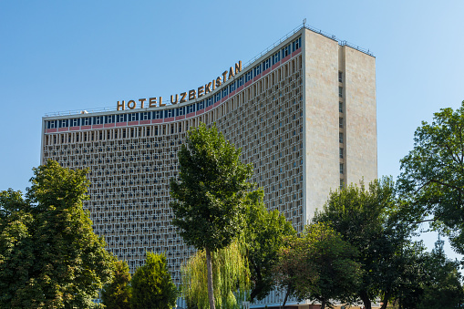 TASHKENT, UZBEKISTAN - AUGUST 22, 2018: Building of Uzbekistan Hotel, the first five star hotel in the city. Tashkent is the capital and largest city of Uzbekistan.