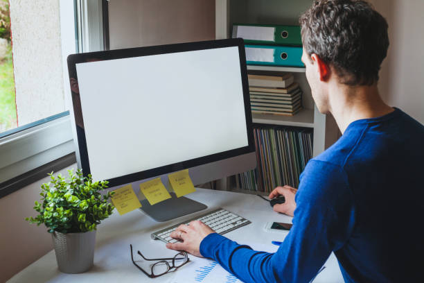 istock entrepreneur business man working on computer with empty blank screen in the office 1057510686