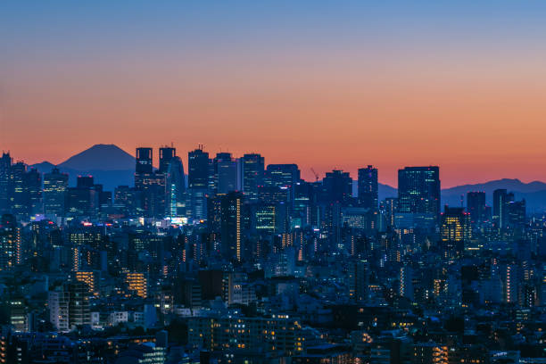 istock tokyo sky twilight with MT.fuji sunset 1057511868