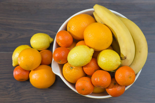 istock fruit bowl with oranges, tangerines and lemons 1057518984