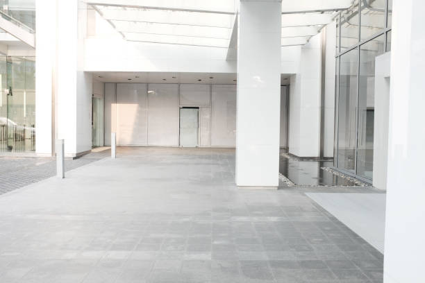 istock Business building blur background office lobby hall interior empty indoor room with blurry light from glass wall window.