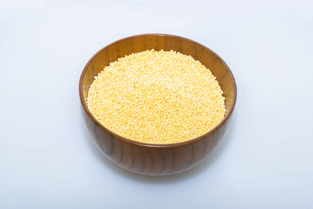istock Millet in a wooden bowl 1057536932
