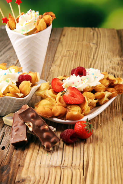 istock Hong Kong style egg waffle on wooden board. bubble waffle 1057538956