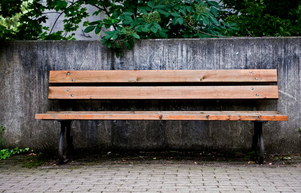 Empty bench empty bench in a residential complex traurig stock pictures, royalty-free photos & images