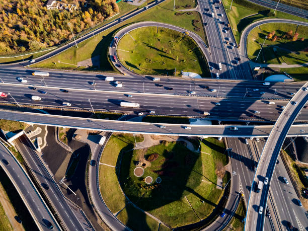 istock Aerial view of a freeway intersection traffic trails in Moscow. 1057558490