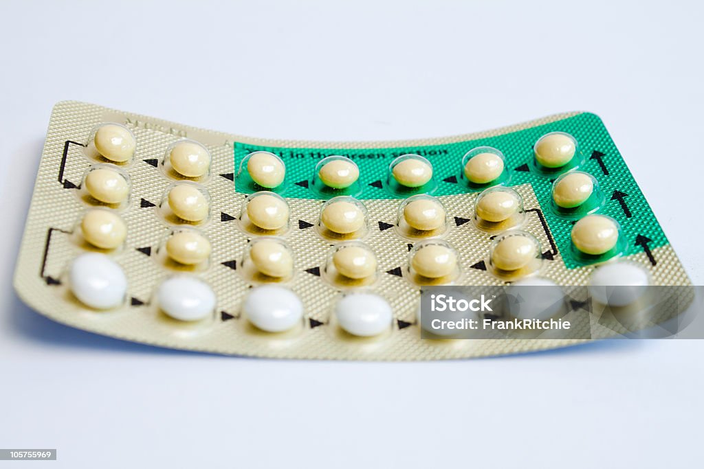 The Pill One round of the pill against a white background Birth Control Pill Stock Photo