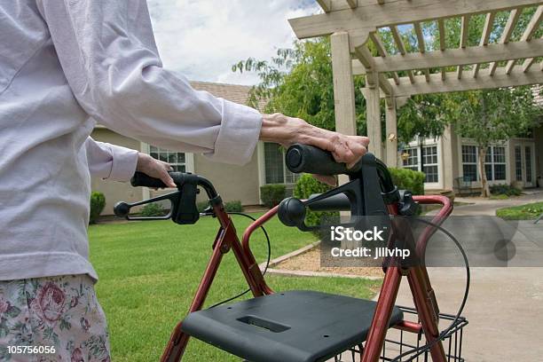 Elderly Woman Using A Walker Outdoors Stock Photo - Download Image Now - Independence - Concept, Senior Adult, Assisted Living