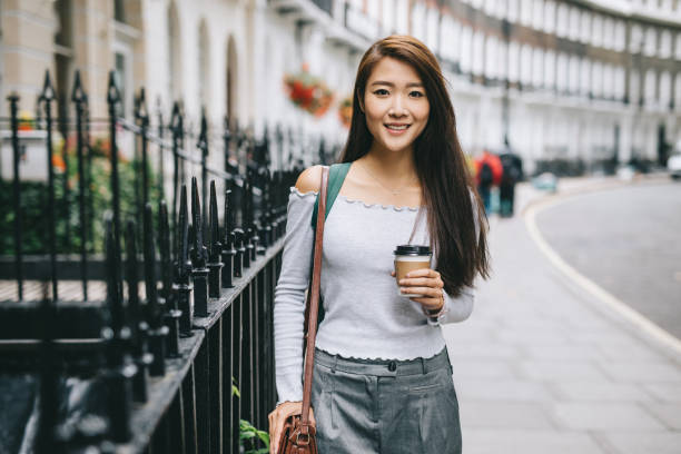 istock Young student walking town the street 1057562858